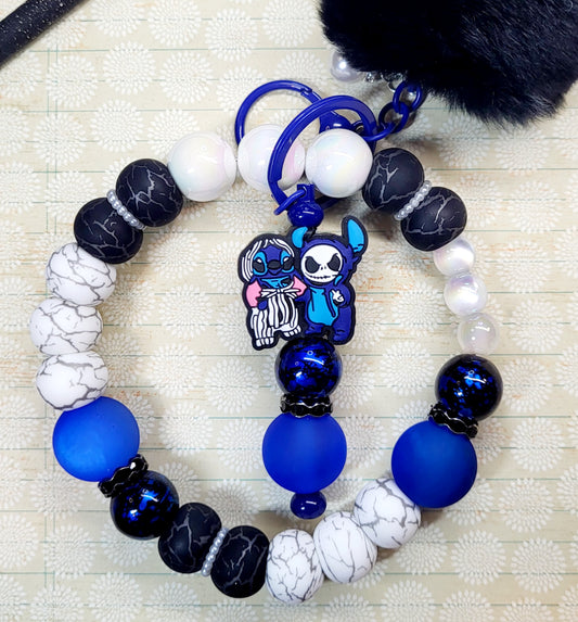 Handmade Beaded Wristlet Keychain – Blue and Black Chunky Beads, Stainless Steel Wire, Character Charm, Black Pom Pom, Durable Keyring